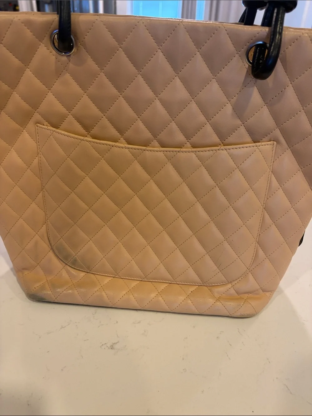 CHANEL Beige Quilted Tote with Black Accents